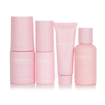 Kylie Skin 4dílná mini sada: pěnivý mýdlo na obličej 30 ml + hydratační krém na obličej 15 ml + sérum s vitamínem C 10 ml + tonikum s vanilkovým mlékem 30 ml